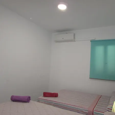 Apartamento And *